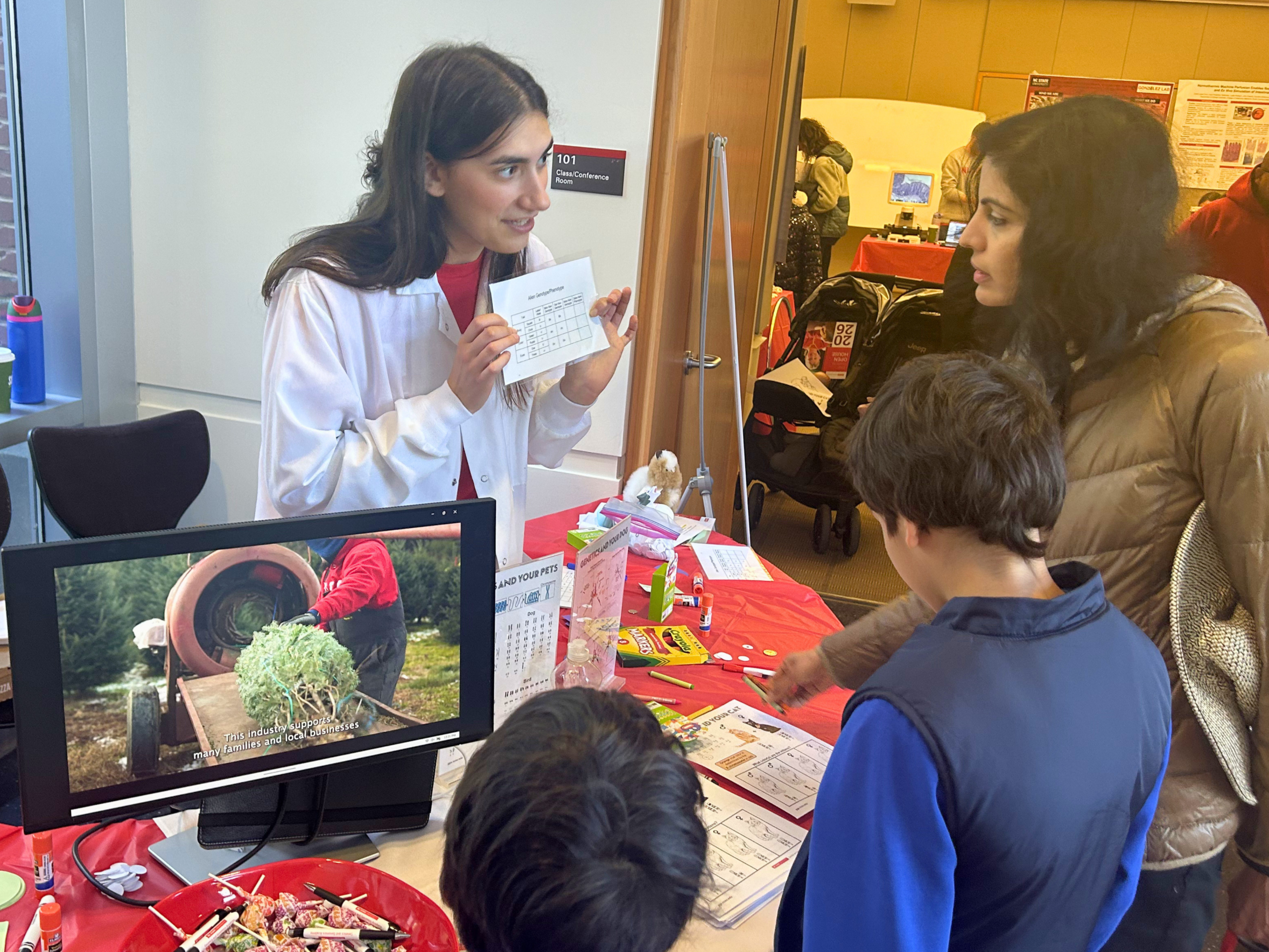 CVM outreach- child learning about genotypes 