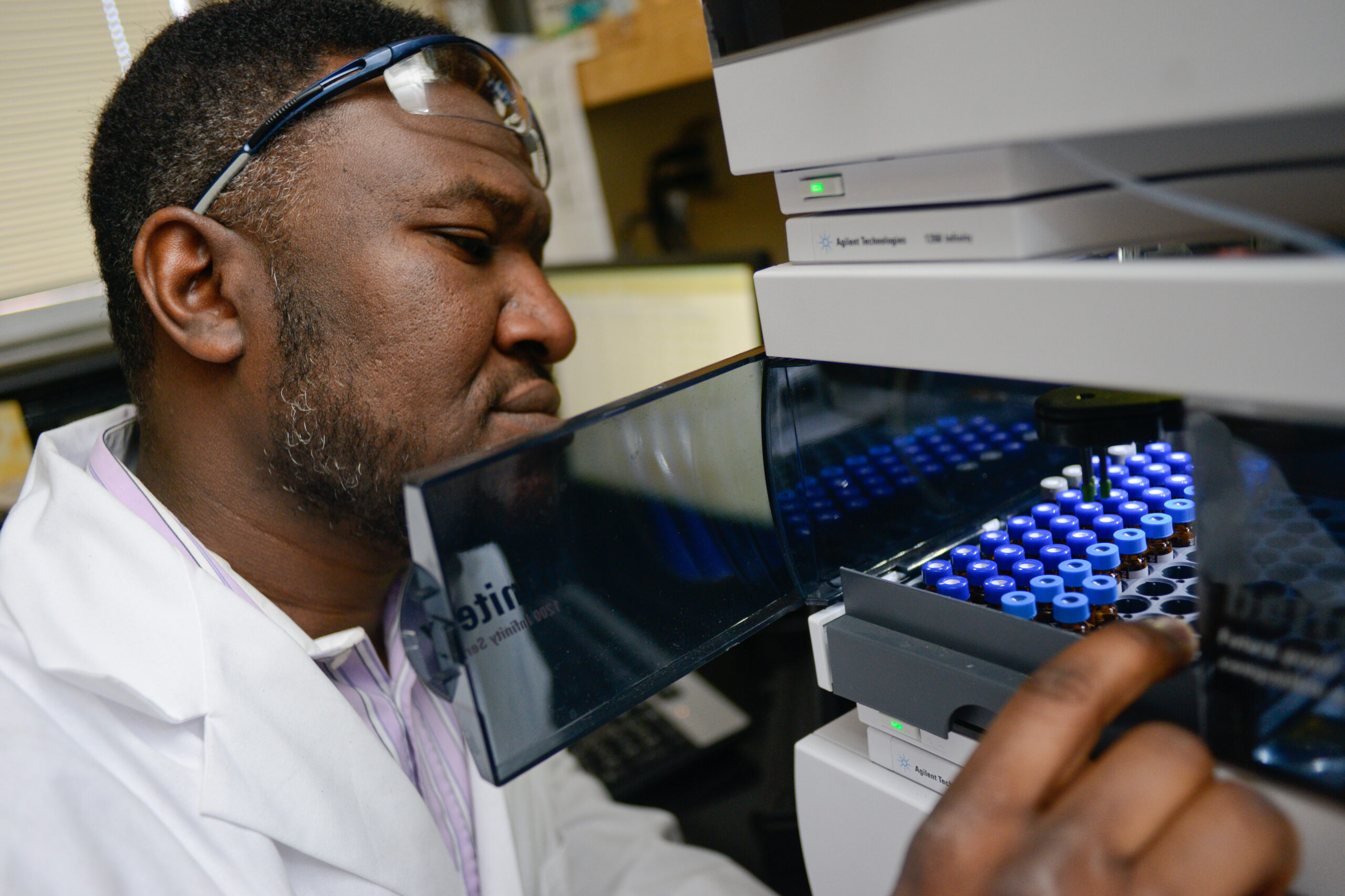 Students work in a crop sciences lab in Williams Hall. Photo by Marc Hall